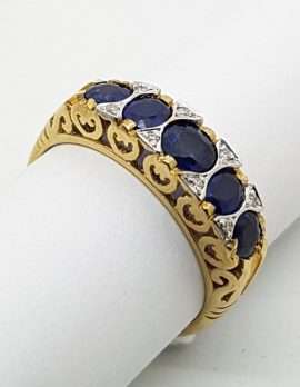 9ct gold ring 5 blue sapphires with diamonds.