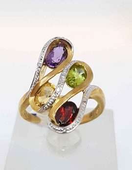 9ct Gold ring with 4 precious stones