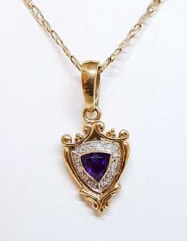 gold necklace amethyst and diamonds with crest design