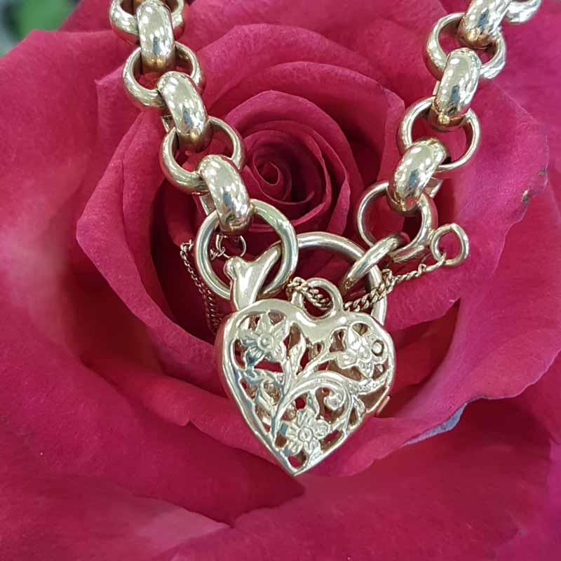 Heart shaped pendant on gold chain