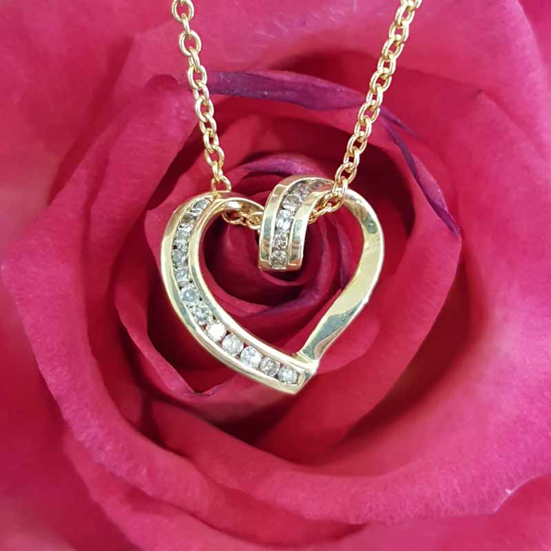 9ct Gold Chanel Set Diamond Heart Pendant on 9ct Chain