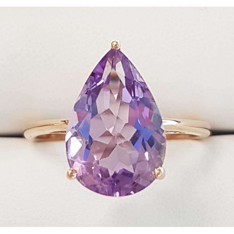Rose Gold ring and teardrop shaped amethyst