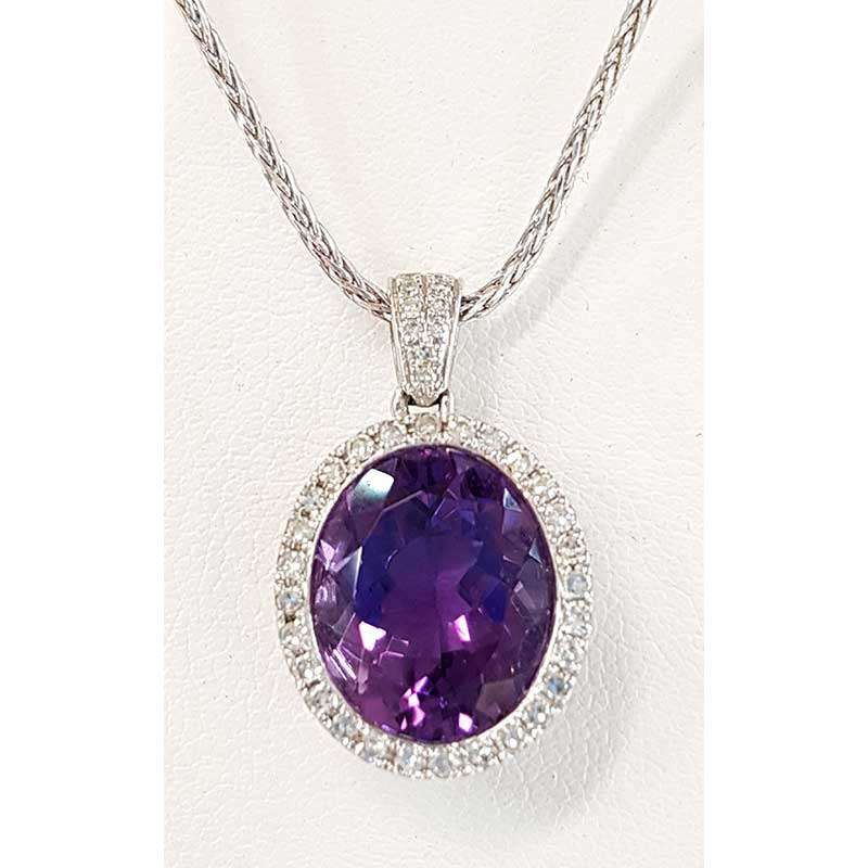 White gold necklace with large oval amethyst and diamonds