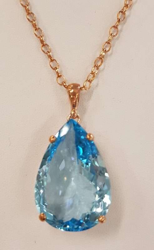 9ct Rose Gold Teardrop Blue Topaz Pendant on 9ct Chain