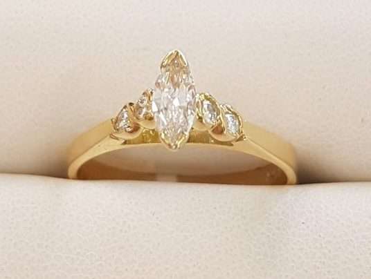 18ct Gold Marquis Cut Diamond with 4 Round Diamonds Engagement Ring