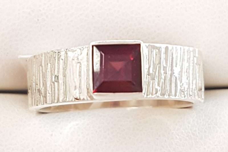 Sterling Silver Square Garnet in Wide Patterned Band Ring