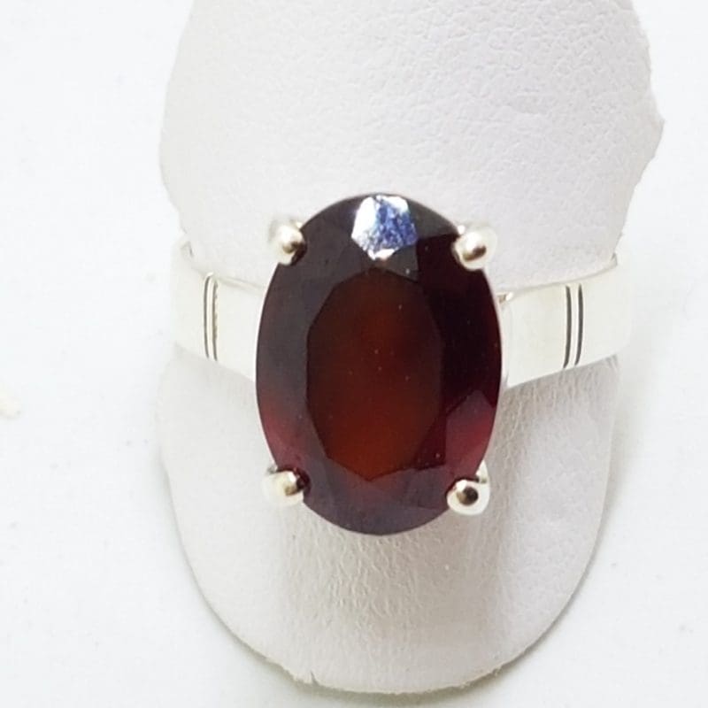 Sterling Silver Garnet Oval Claw Set Ring
