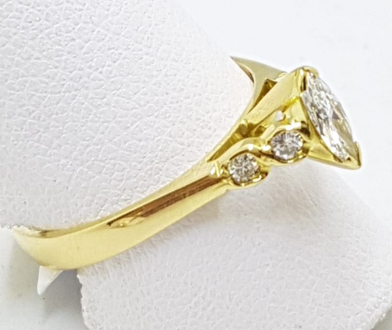 18ct Gold Marquis Cut Diamond with 4 Round Diamonds Engagement Ring