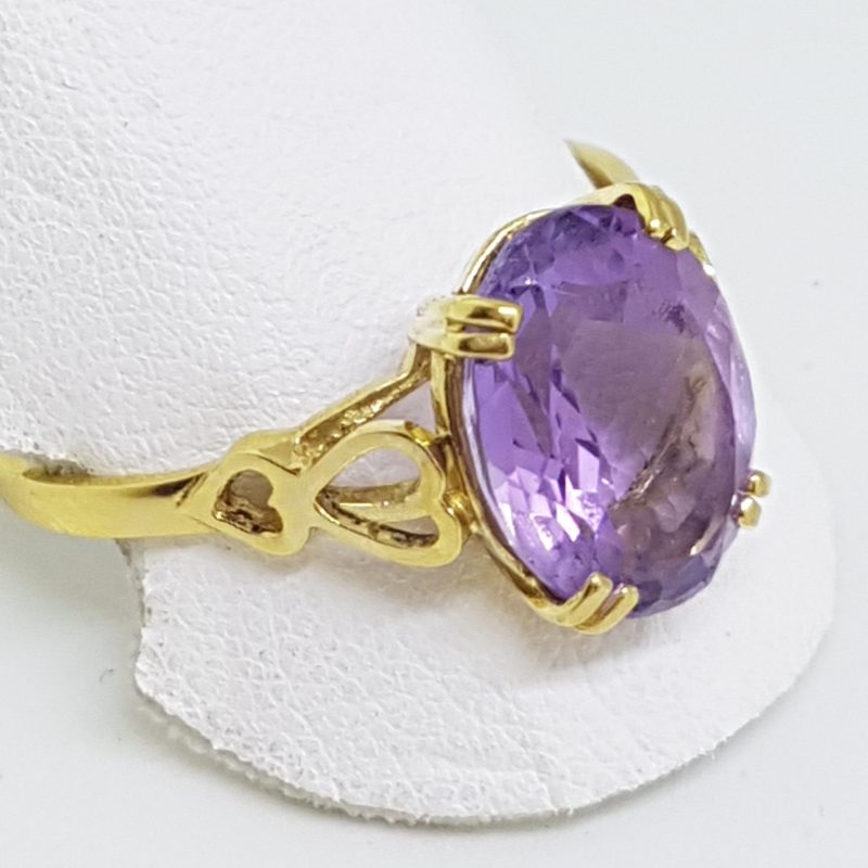 14ct Yellow Gold Large Oval Amethyst with Heart Design Ring
