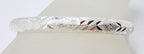 Sterling Silver Stardust Patterned Hinged Bangle - Hollow