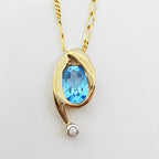 9ct Yellow Gold Oval Topaz &amp; Diamond Curved Pendant on Gold Chain