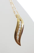 9ct Yellow Gold Channel Set Diamond Curved Pendant on Gold Chain