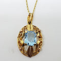 14ct Yellow Gold Oval Blue Paste Ornate Pendant on Gold Chain