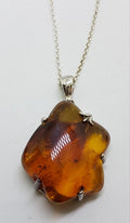 Sterling Silver Natural Amber Large Claw Set Pendant on Silver Chain