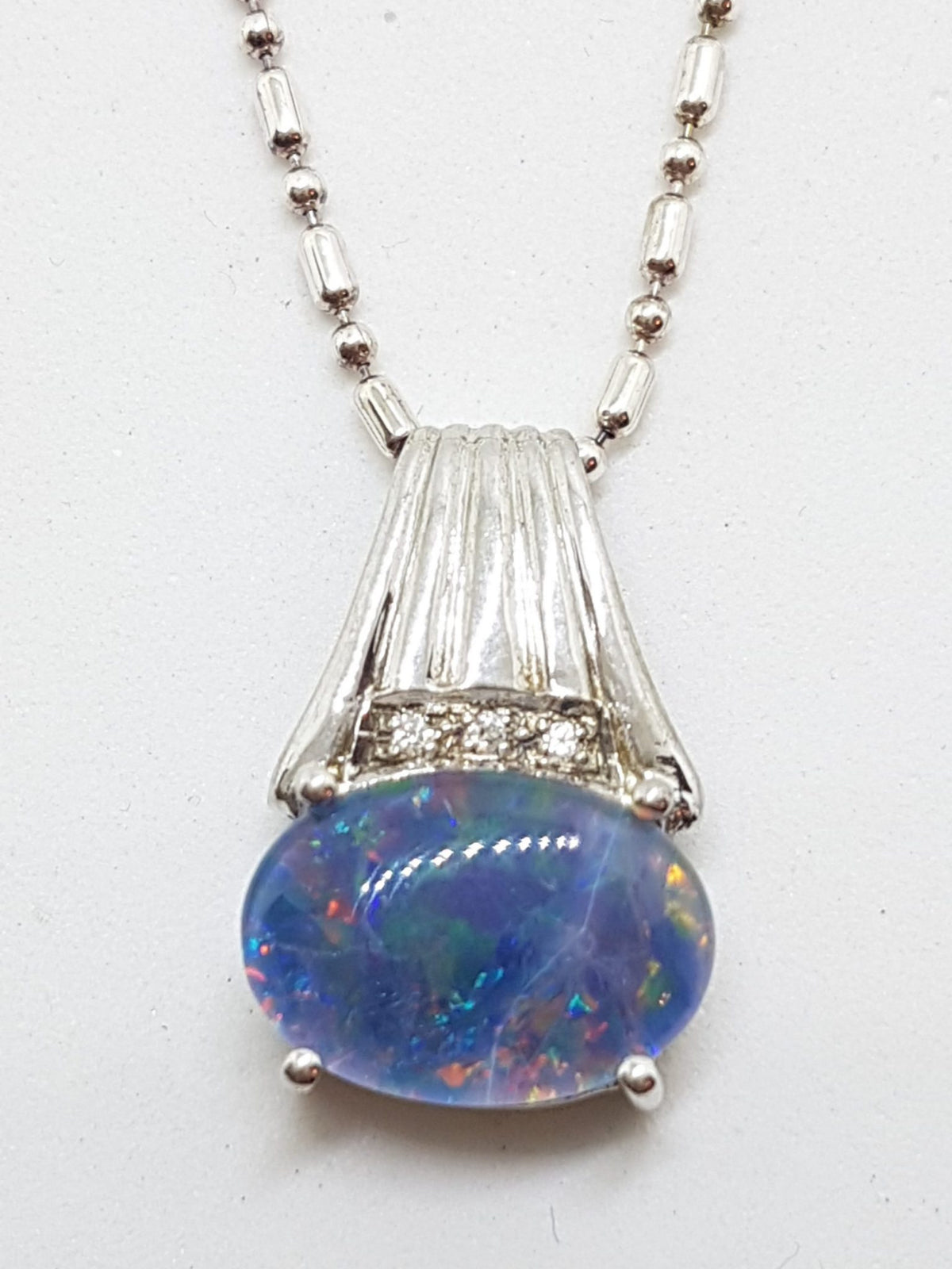 Sterling Silver Oval Blue Opal &amp; Cubic Zirconia Pendant on Silver Chain