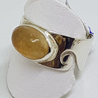 Sterling Silver Oval Rutilated Quartz in Wide Band Ring with Wave Design