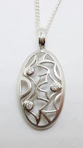 Sterling Silver Cubic Zirconia Oval Filigree Pendant on Silver Chain