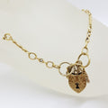 9ct Yellow Gold Round and Twist Link Bracelet with Shield / Heart Padlock Clasp