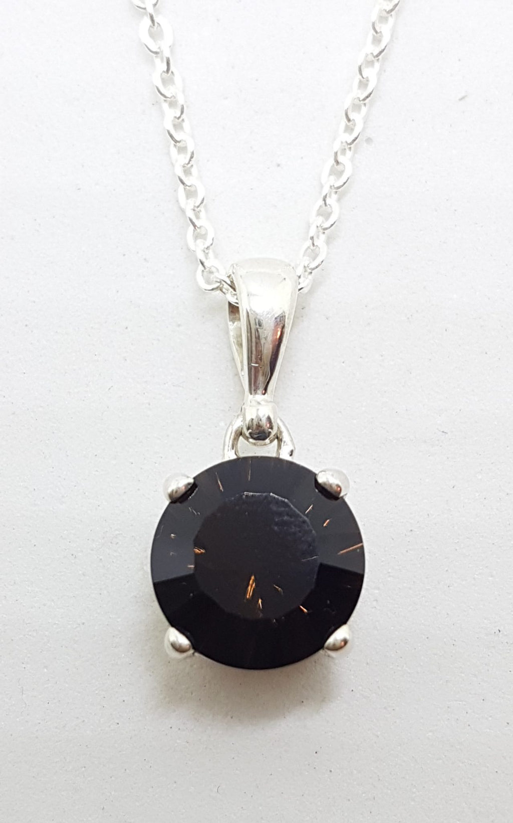 Sterling Silver Round Laser Cut Smokey Quartz Pendant on Silver Chain