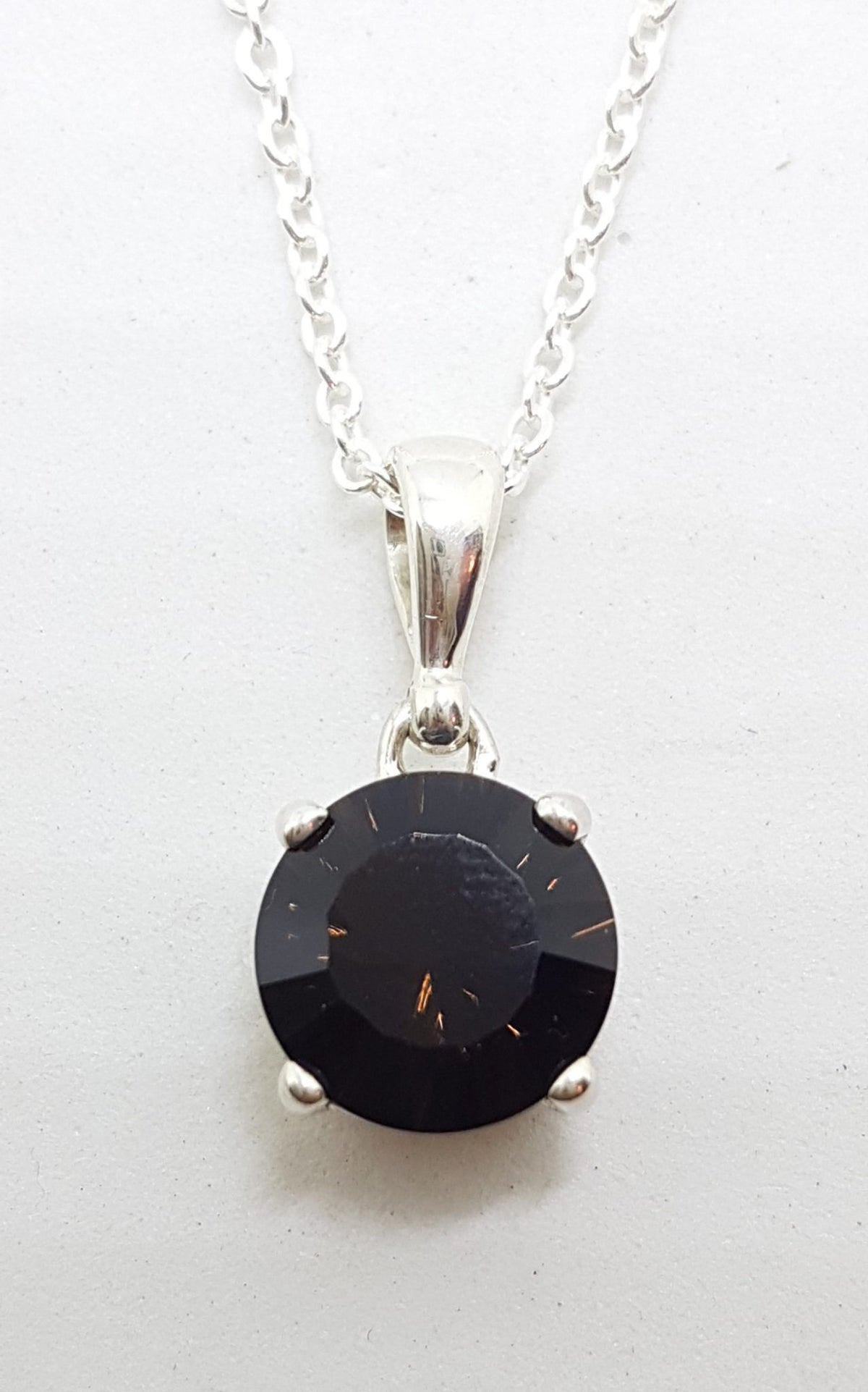 Sterling Silver Round Laser Cut Smokey Quartz Pendant on Silver Chain