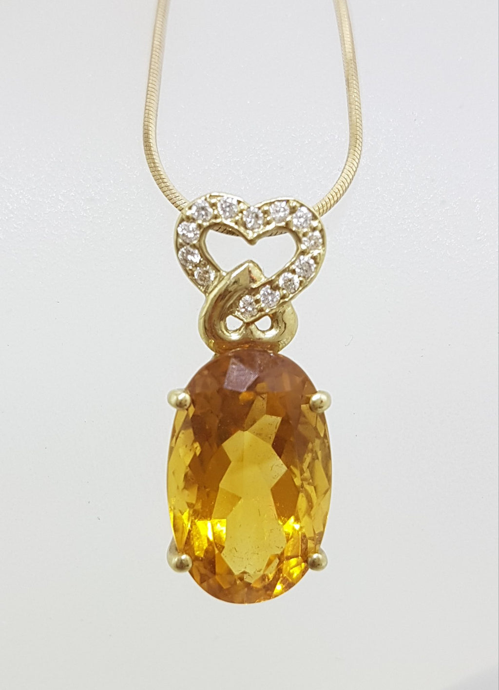9ct Yellow Gold Oval Citrine with Diamond Heart Pendant on Gold Chain