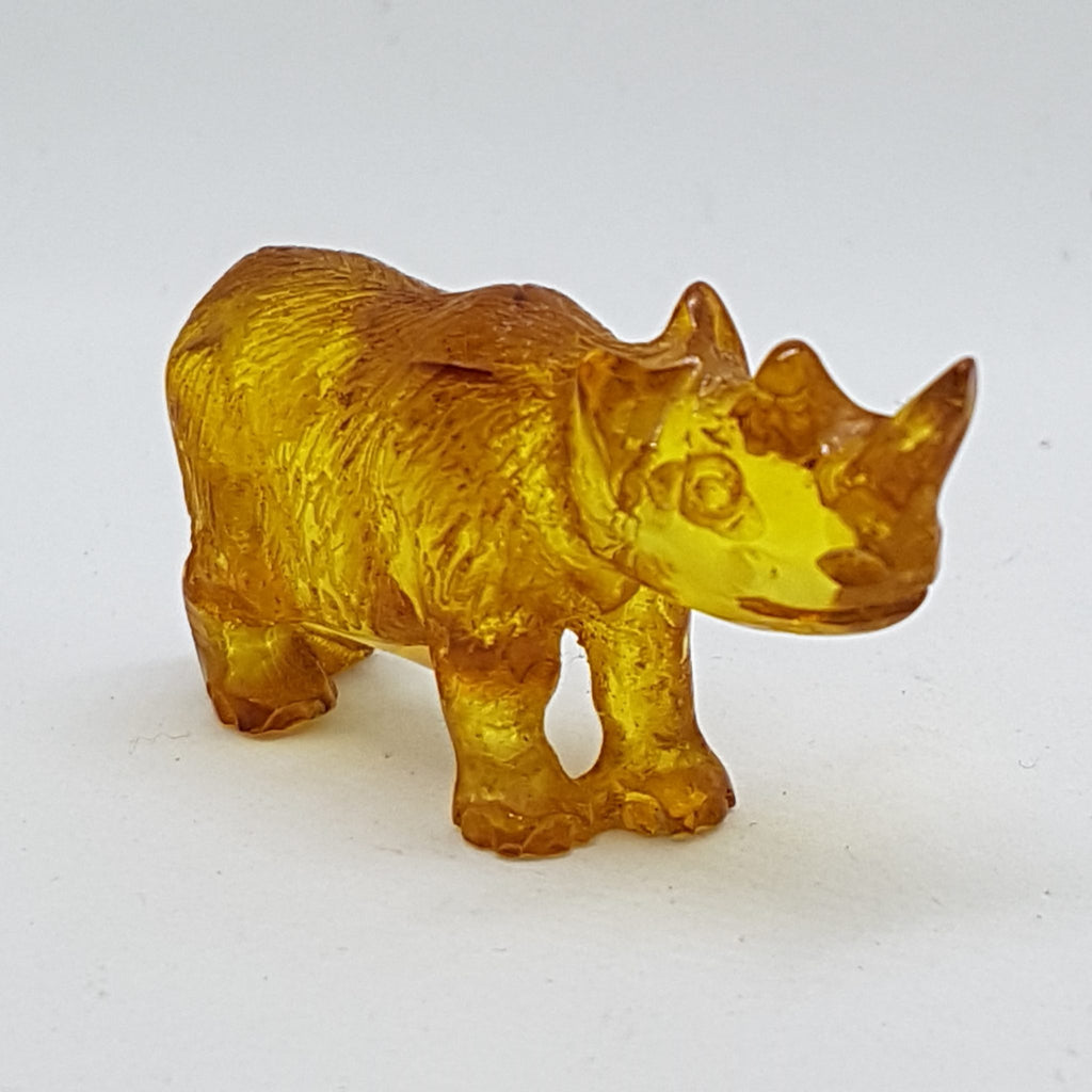 Hand Carved Natural Baltic Amber Small Rhinoceros Figurine / Statue