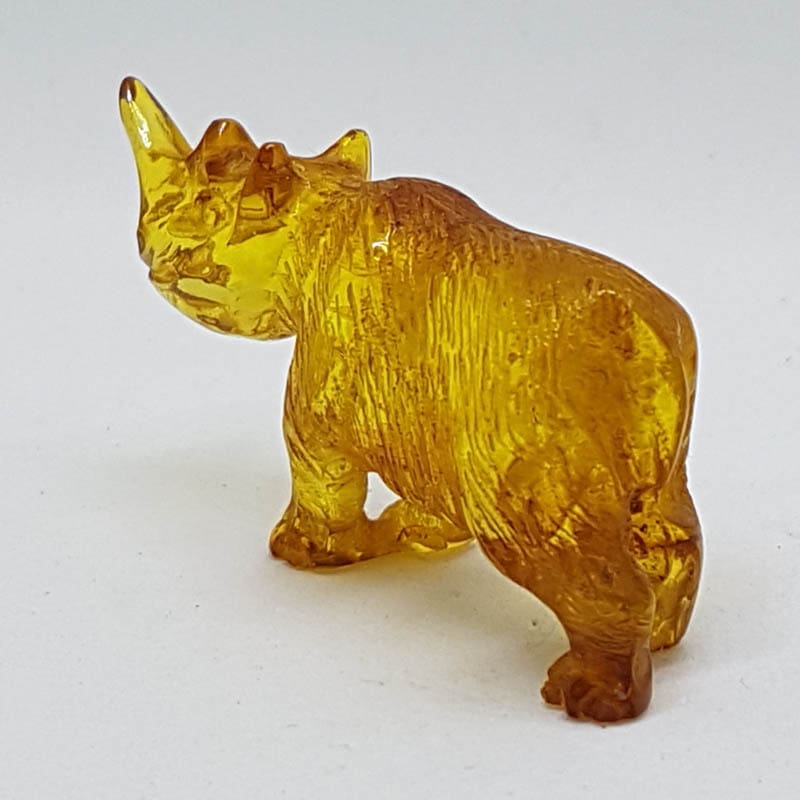 Hand Carved Natural Baltic Amber Small Rhinoceros Figurine / Statue
