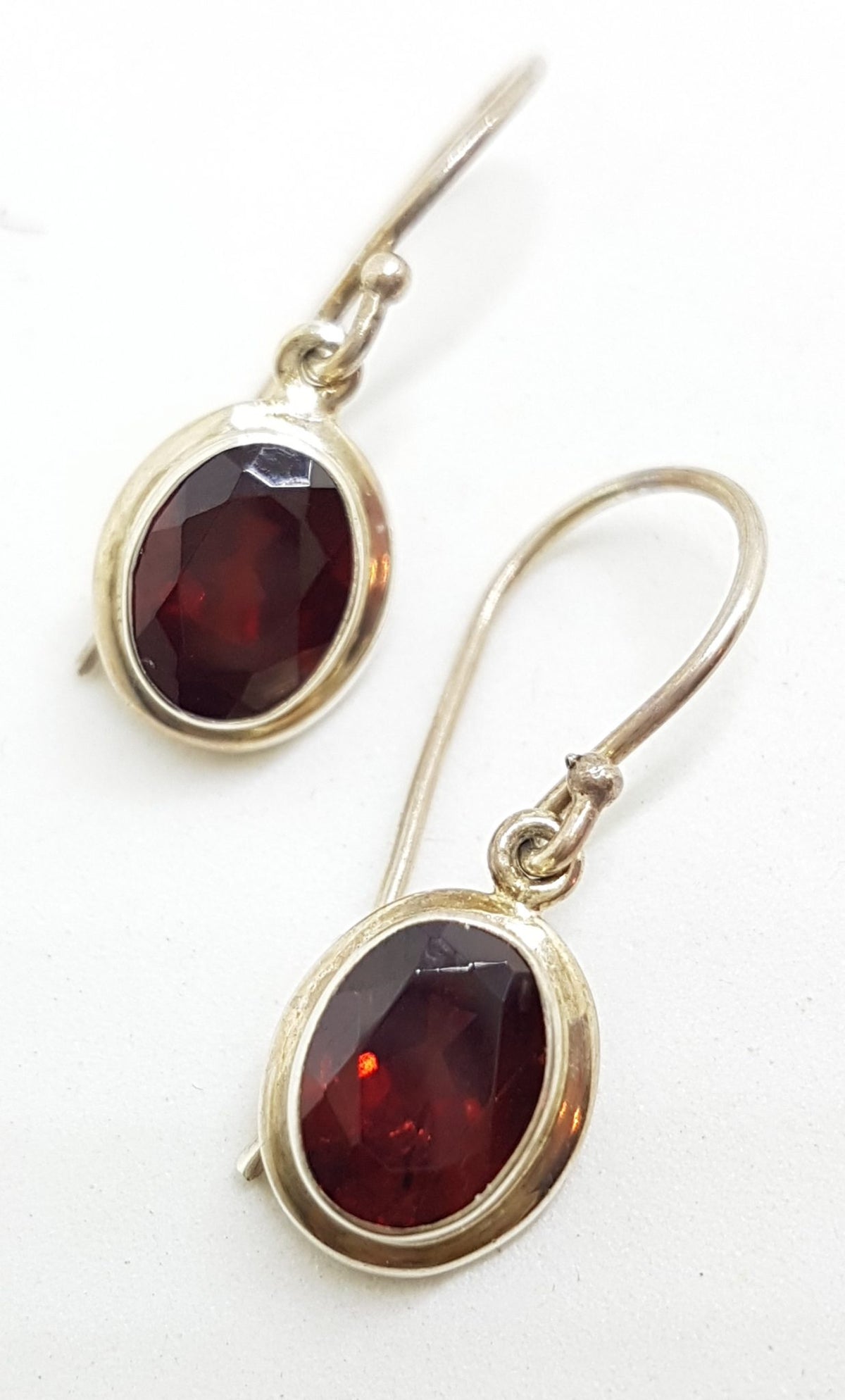 Sterling Silver Oval Bezel Set Garnet Drop Earrings