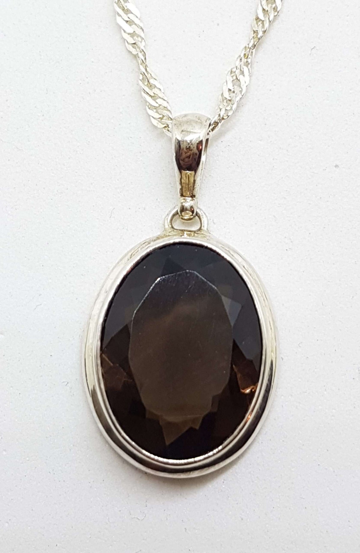 Sterling Silver Oval Bezel Set Smokey Quartz Pendant on Silver Chain - with Rim