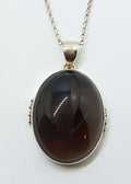 Sterling Silver Oval Bezel Set Cabochon Cut Smokey Quartz Pendant on Silver Chain