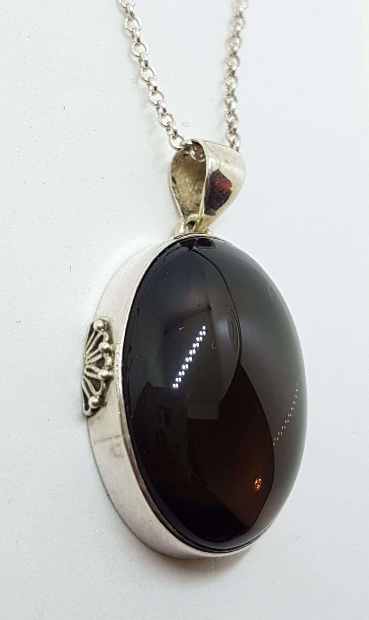 Sterling Silver Oval Bezel Set Cabochon Cut Smokey Quartz Pendant on Silver Chain