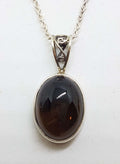 Sterling Silver Oval Ornate Filigree Bezel Set Cabochon Cut Smokey Quartz Pendant on Silver Chain