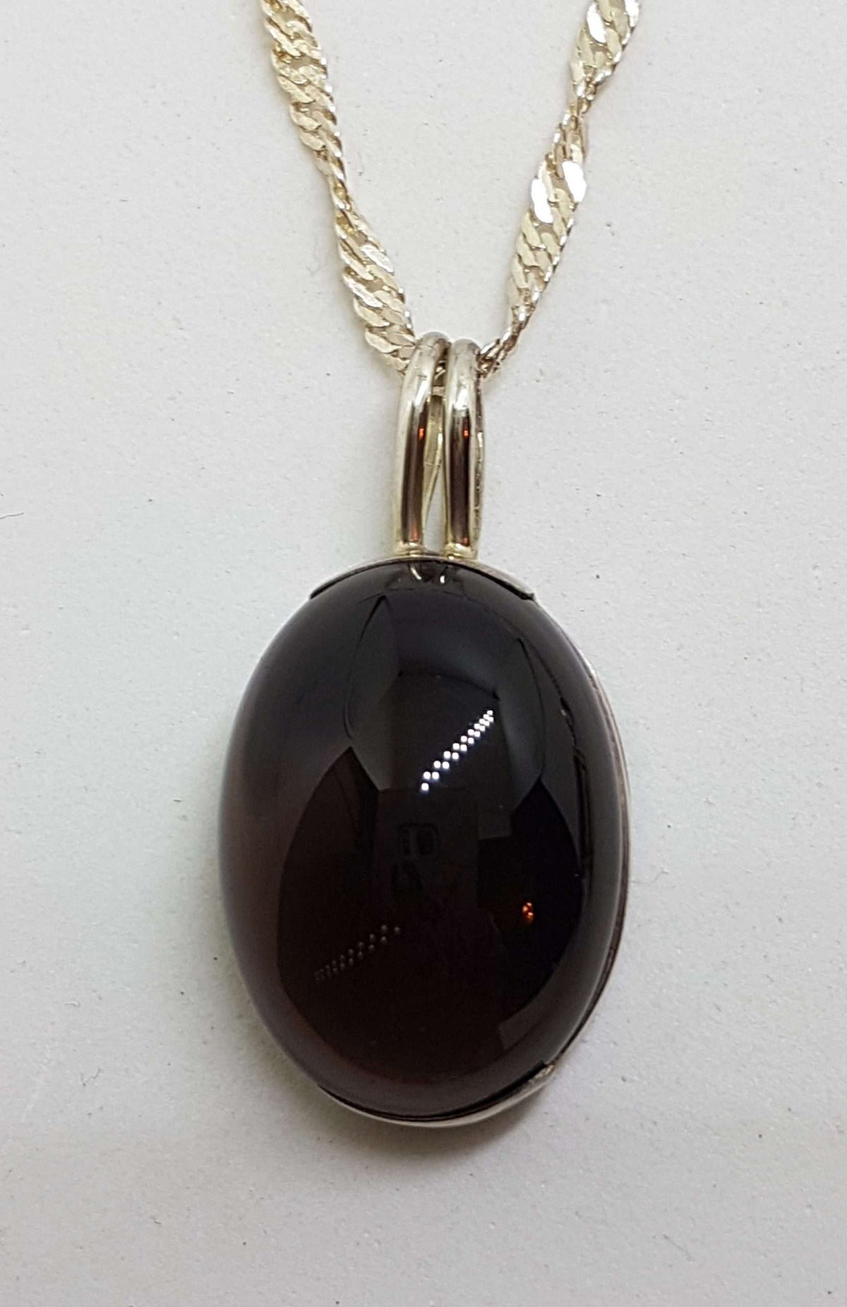 Sterling Silver Oval Cabochon Cut Smokey Quartz Pendant on Silver Chain