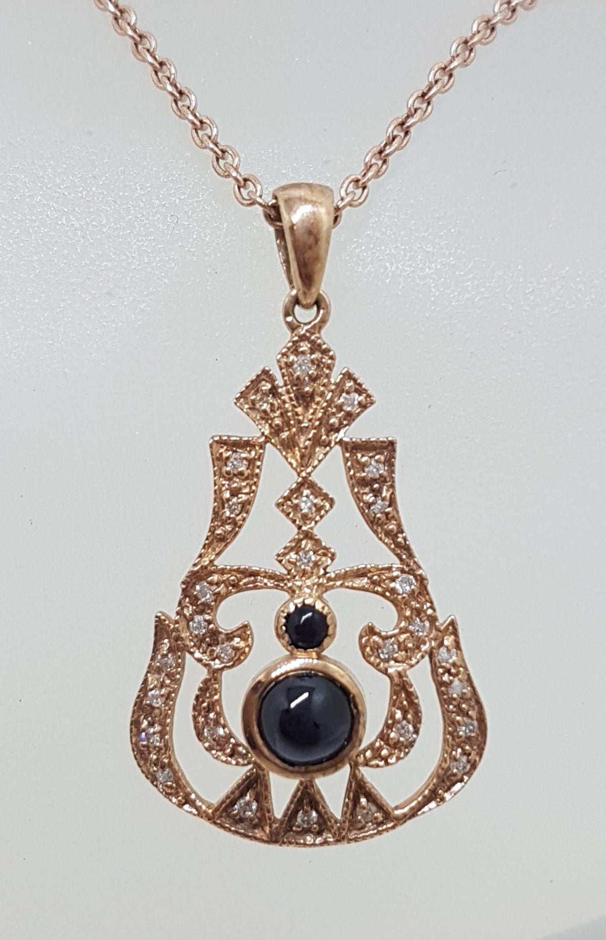 9ct Rose Gold Onyx and Diamond Pendant on 9ct Chain