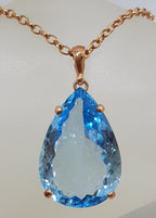 9ct Rose Gold Teardrop Blue Topaz Pendant on 9ct Chain