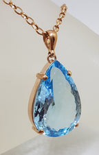 9ct Rose Gold Teardrop Blue Topaz Pendant on 9ct Chain