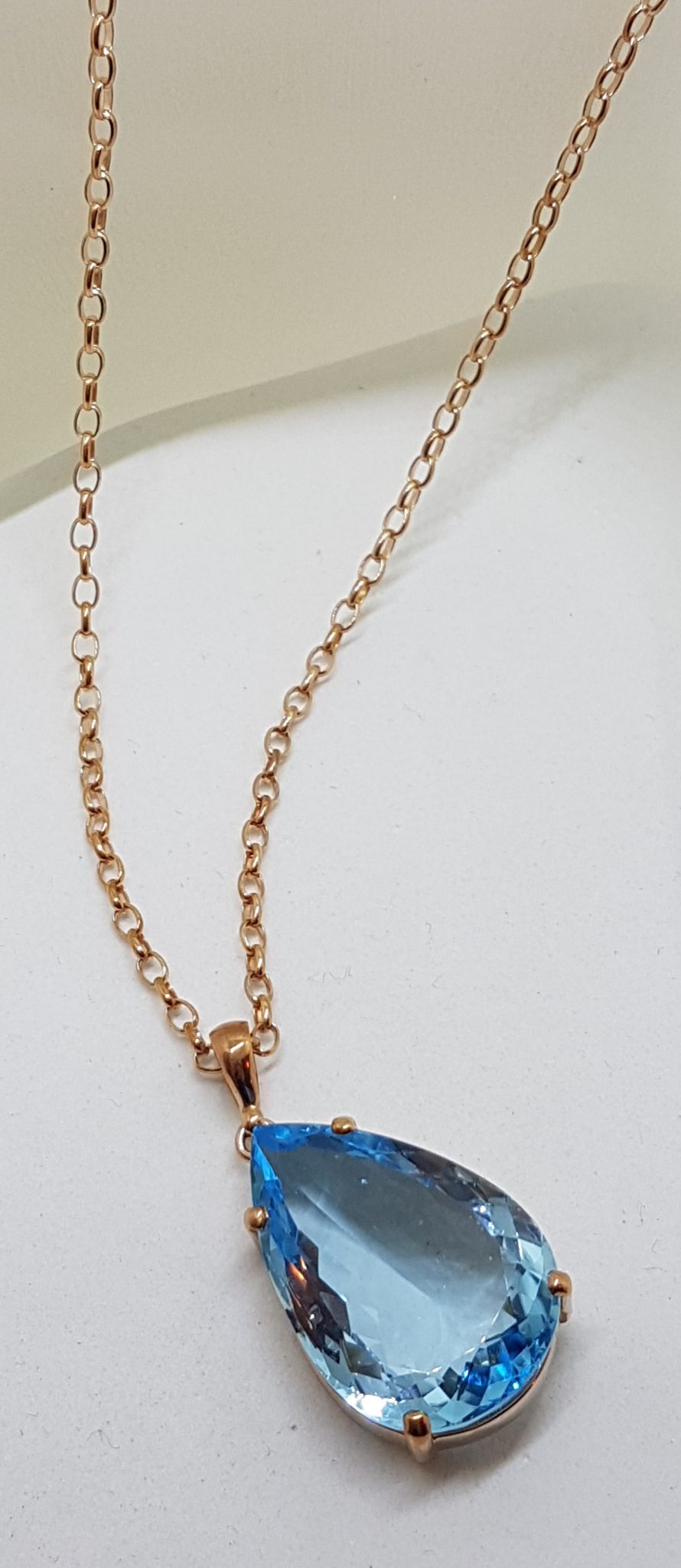 9ct Rose Gold Teardrop Blue Topaz Pendant on 9ct Chain