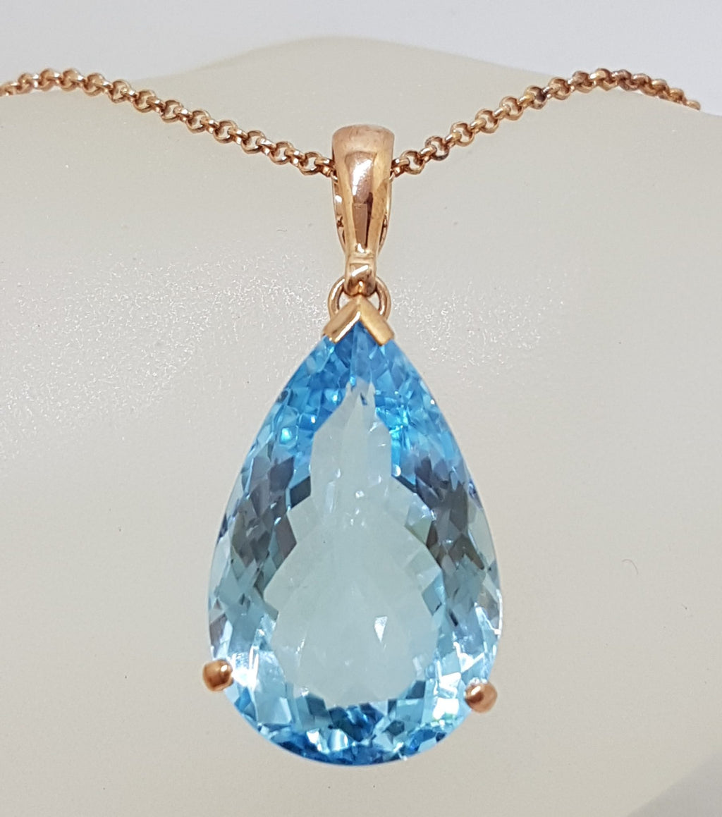 9ct Rose Gold Large Teardrop Shape Blue Topaz Pendant on 9ct Chain