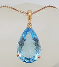 9ct Rose Gold Large Teardrop Shape Blue Topaz Pendant on 9ct Chain