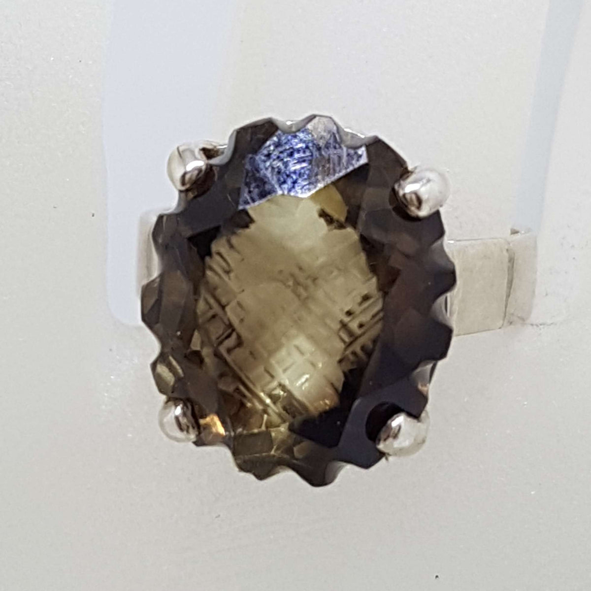 Sterling Silver Oval Unusual Faceted / Carved Claw Set Smokey Quartz Ring