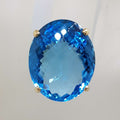 9ct Yellow Gold Large Oval Deep Blue Cushion Cut Topaz Claw Set Cocktail Ring
