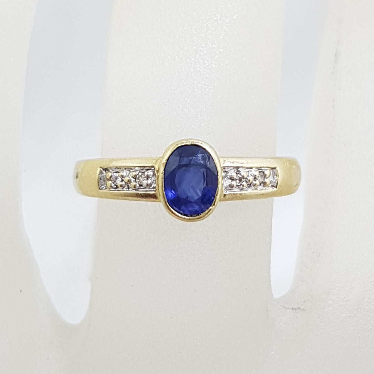 9ct Yellow Gold Oval Natural Blue Sapphire and Diamond Bezel Set Ring