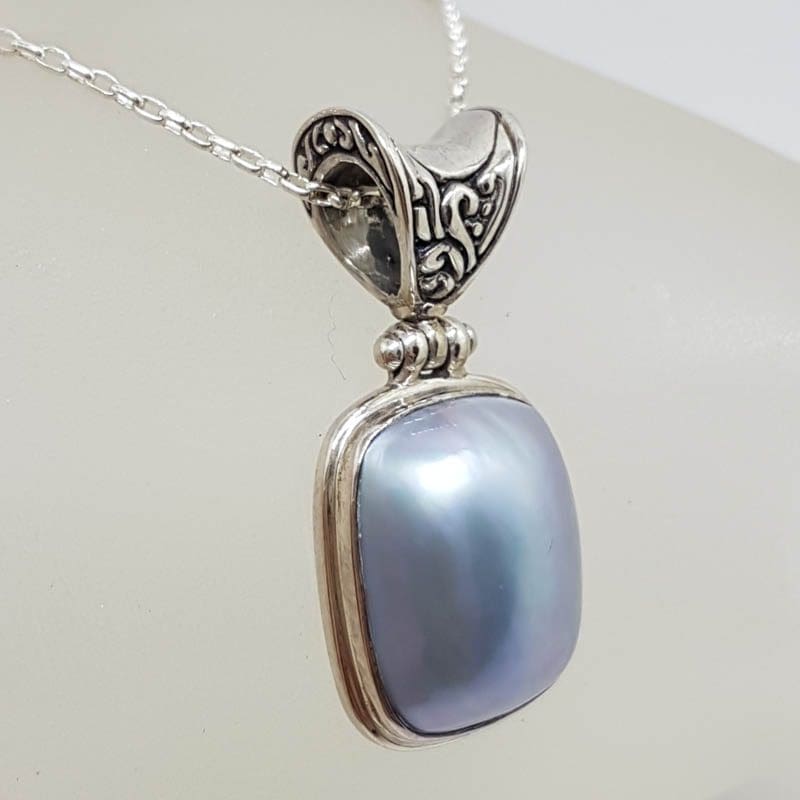 Sterling Silver Rectangular Blue / Grey Mabe Pearl Ornate Top Pendant on Silver Chain