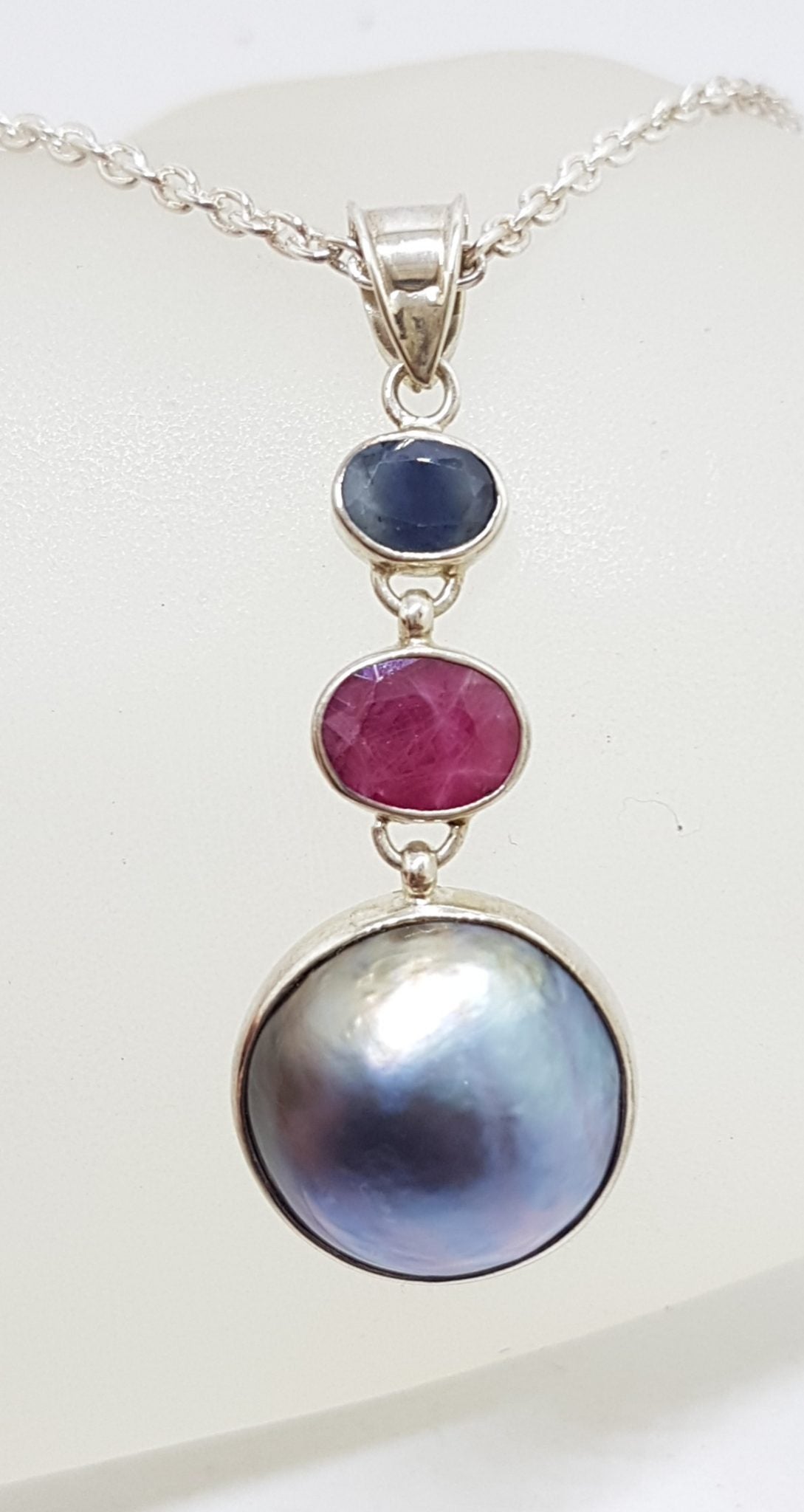 Sterling Silver Black / Blue Mabe Pearl Ruby and Sapphire Pendant on Silver Chain