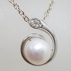 Sterling Silver Pearl with Cubic Zirconia Swirl Pendant on Silver Chain