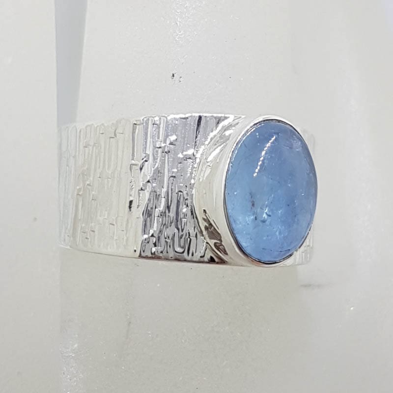 Sterling Silver Oval Bezel Set on Wide Patterned Design Band Cabochon Cut Aquamarine Ring