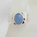 Sterling Silver Oval Bezel Set on Wide Beaten Design Band Cabochon Cut Aquamarine Ring