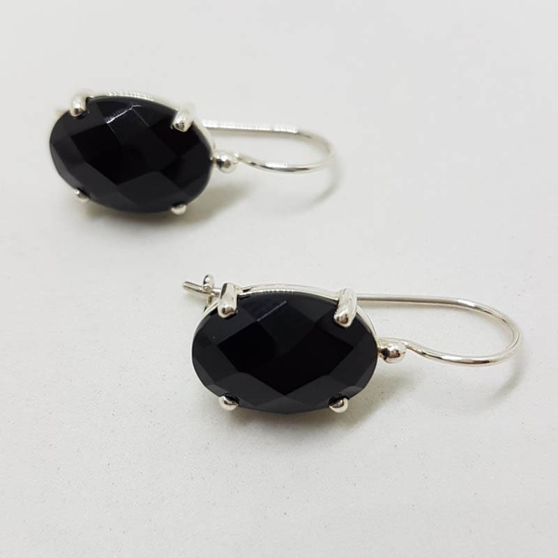 Sterling Silver Oval Faceted Onyx Claw Set Drop Earrings