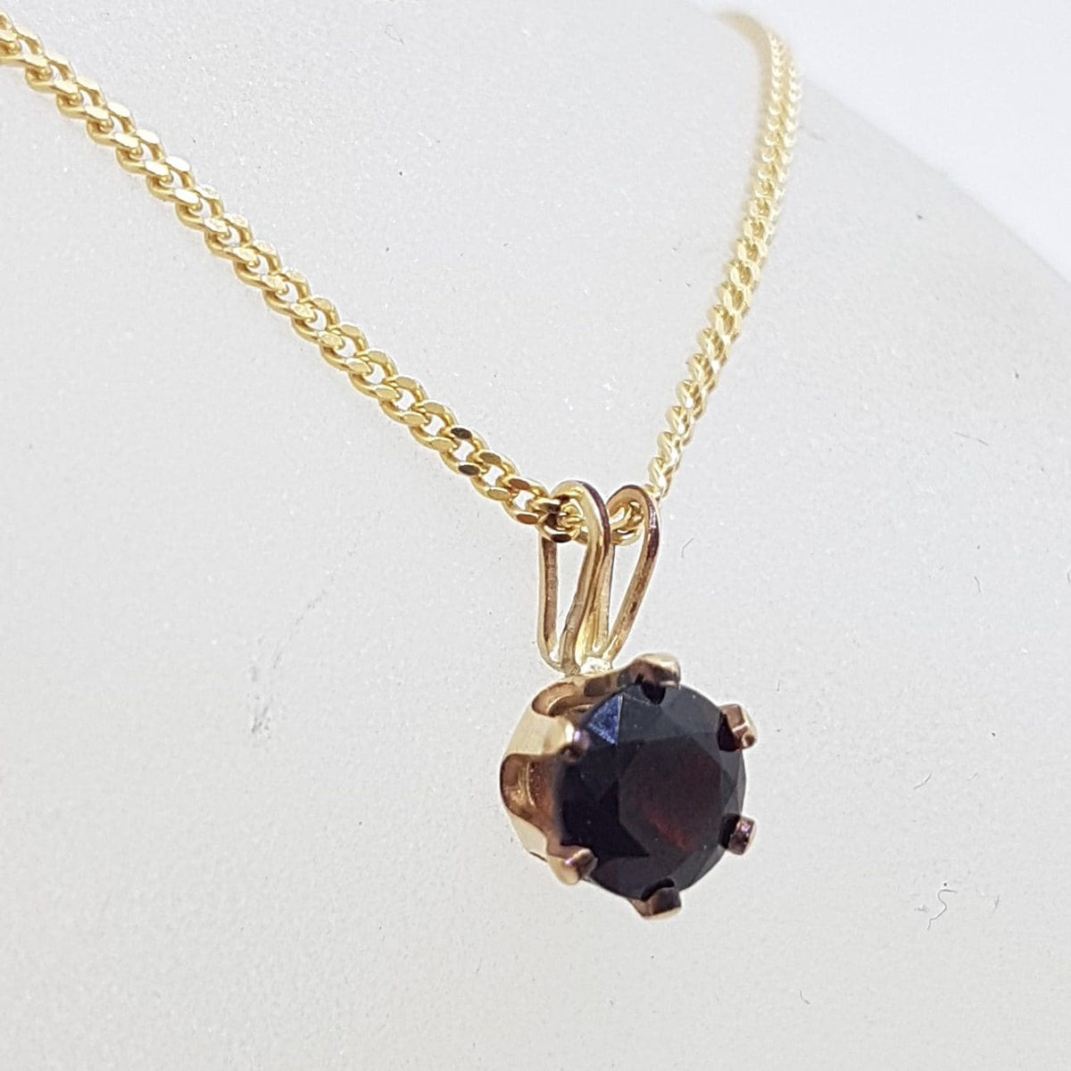 9ct Yellow Gold Round Claw Set Garnet Pendant on Gold Chain