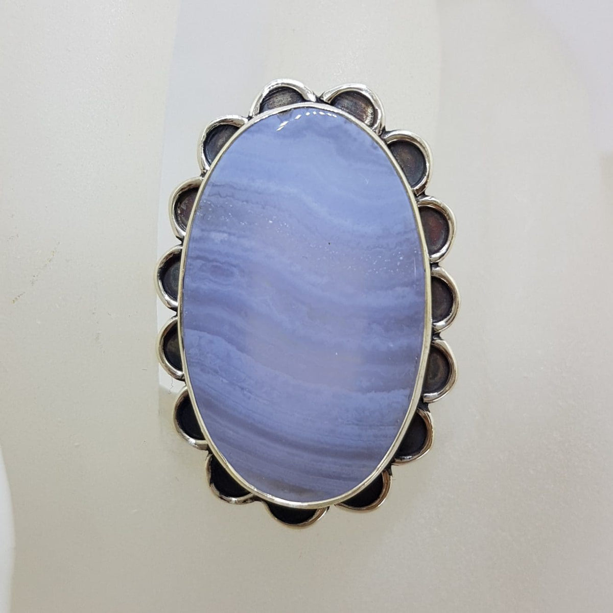 Sterling Silver Large Oval Blue Lace Agate with Ornate Rim Ring - Faceted